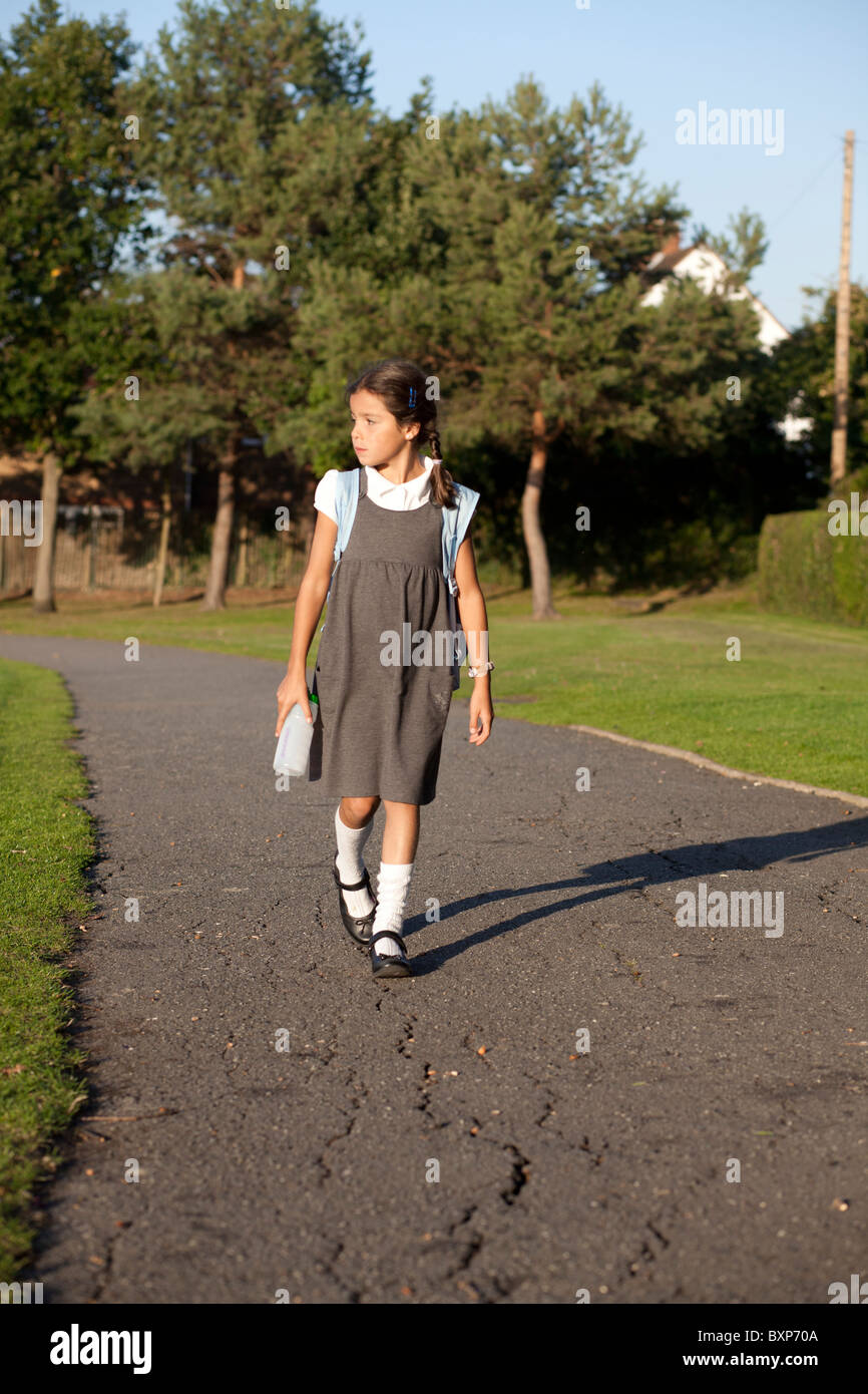 girl walking home from school Stock Photo Alamy