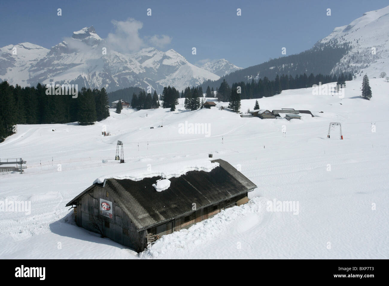 Hut half buried in snow at Mount Titlis in Switzerland Stock Photo - Alamy