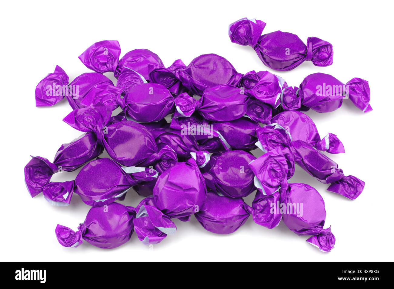 Pile of purple wrapped toffees Stock Photo