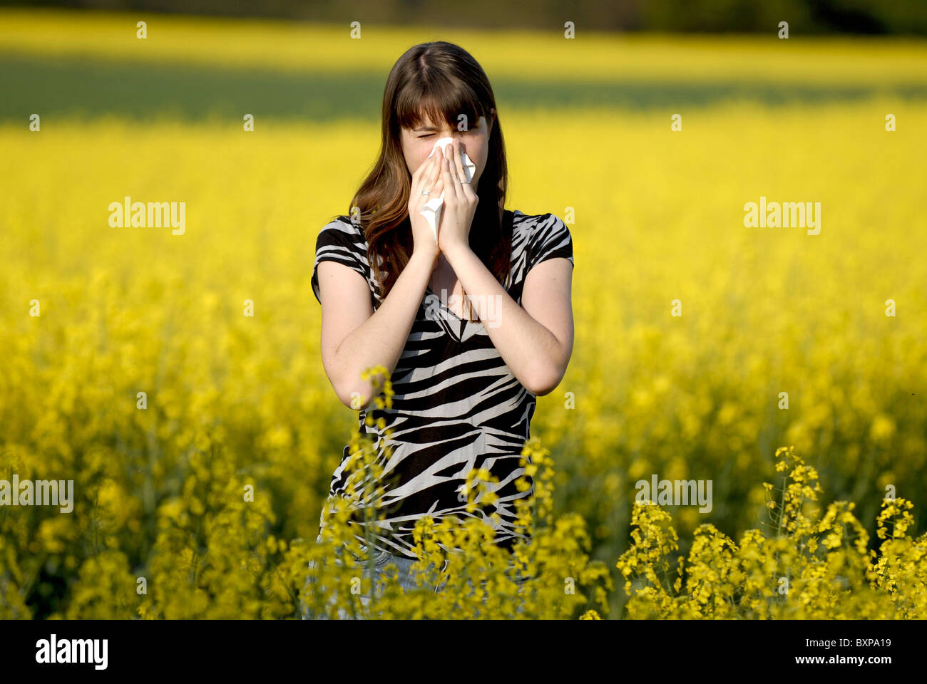 Young woman suffering from hay fever Stock Photo