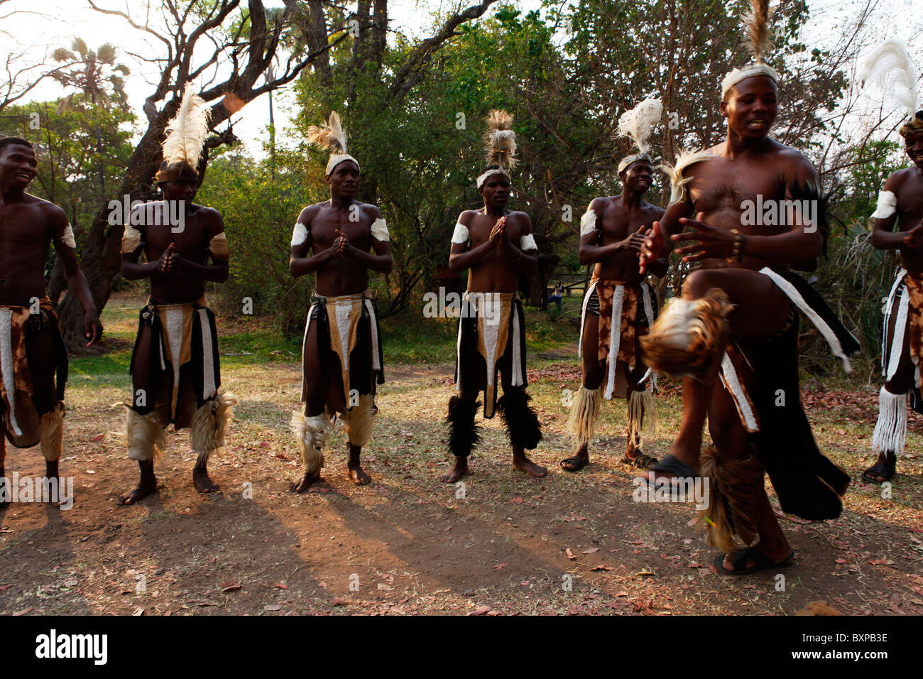 Tribal singers dancing at Victoria Falls, Zimbabwe. Stock Photo
