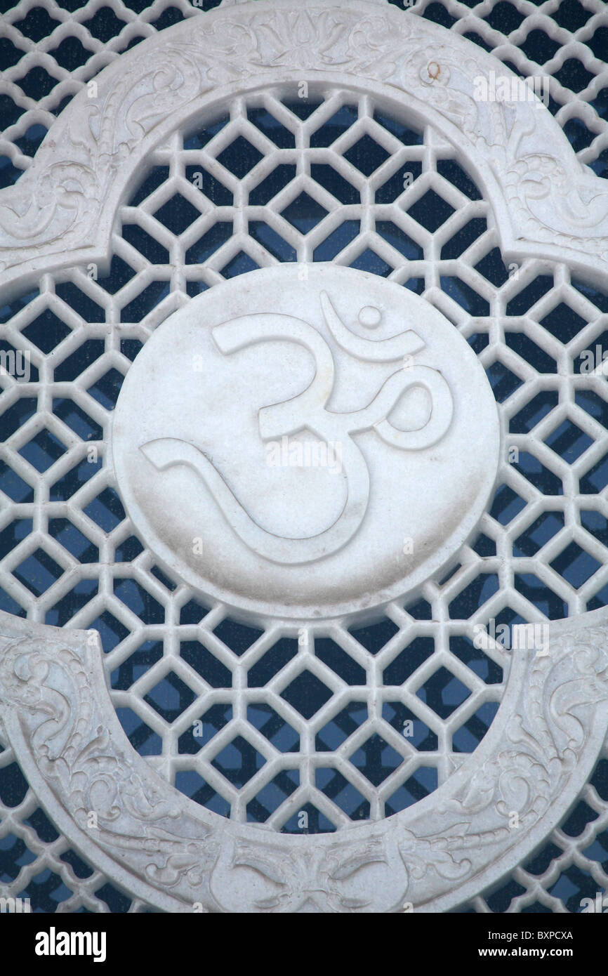 Om symbol carved on the Shri Lakshmi Narayan temple in Jaipur, Rajasthan, Northern India Stock Photo