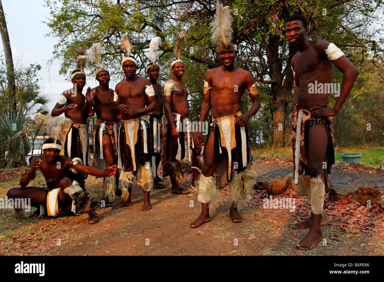 Tribal singers dancing at Victoria Falls, Zimbabwe. Stock Photo