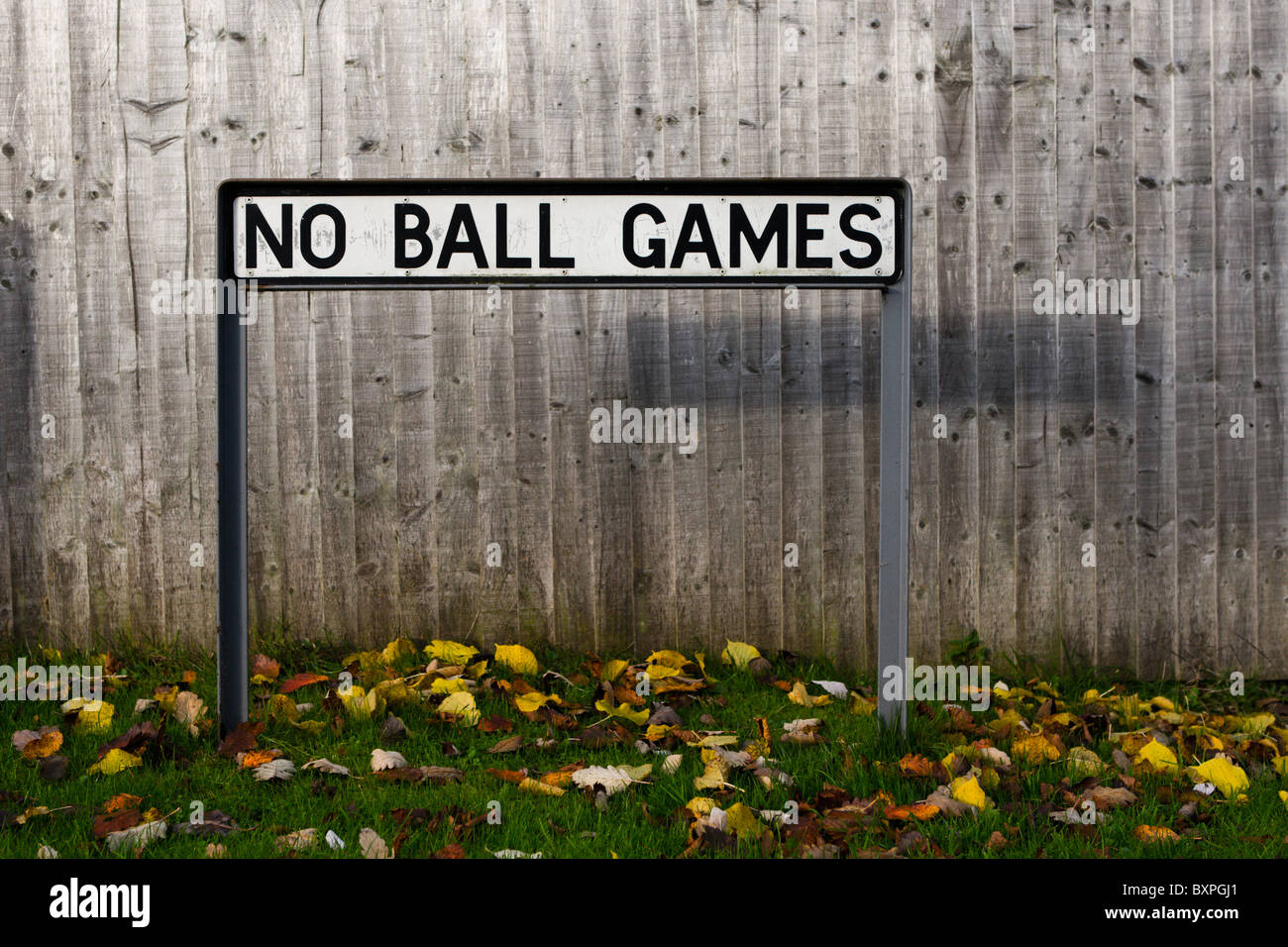 No ball games sign in front of fence in Slinfold, West Sussex, England Stock Photo
