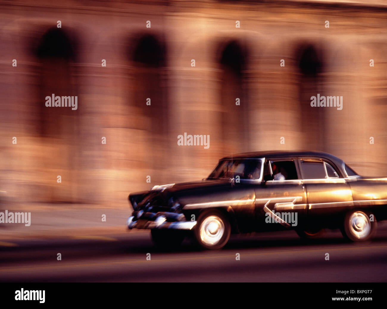 Vintage Car Driving, Blurred Motion Stock Photo