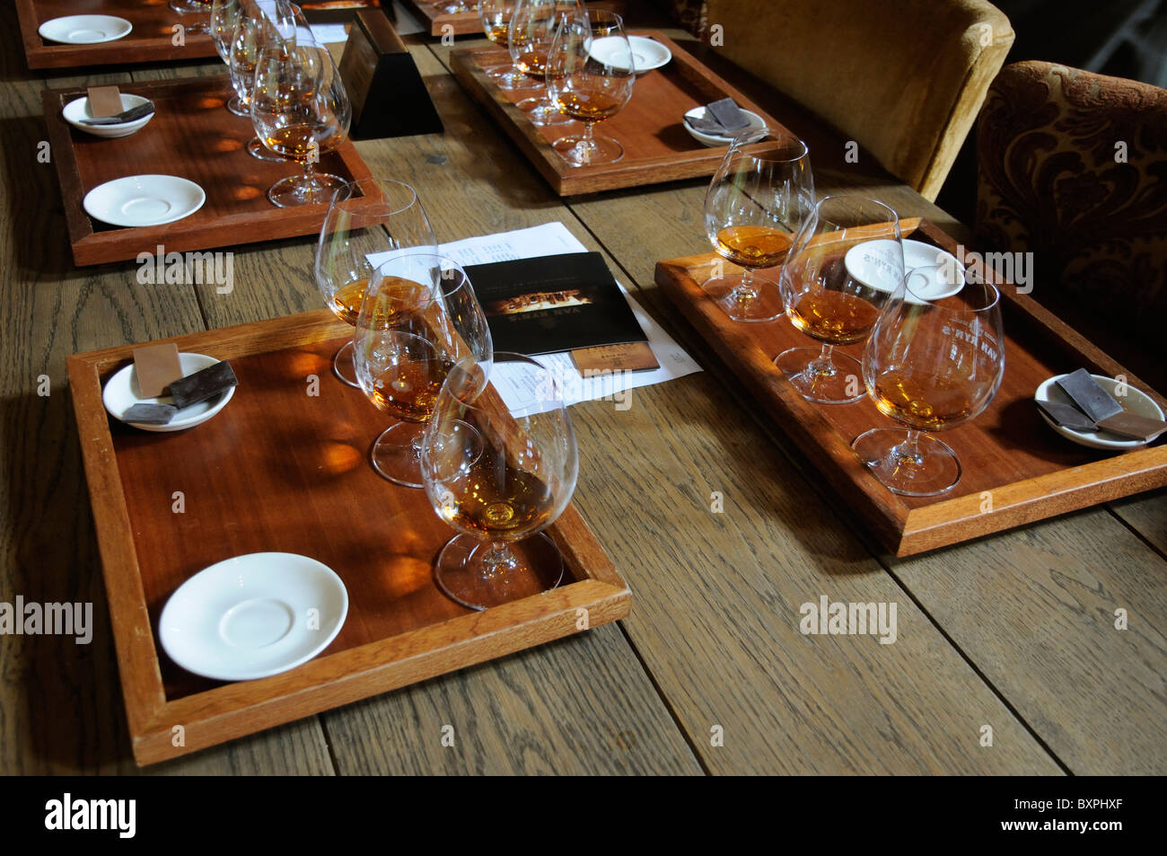 Van Ryan's Brandy Distillery in the Vlottenburg Valley near Stellenbosch Cape Province South Africa Tourists tasting table Stock Photo