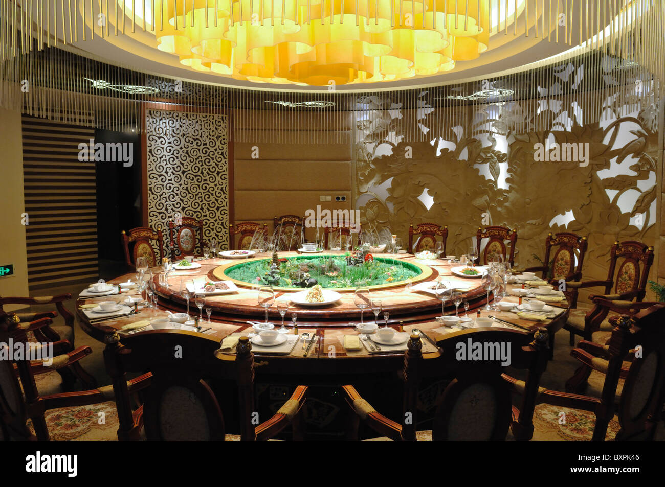 A round table laid for a traditional Chinese banquet Stock Photo