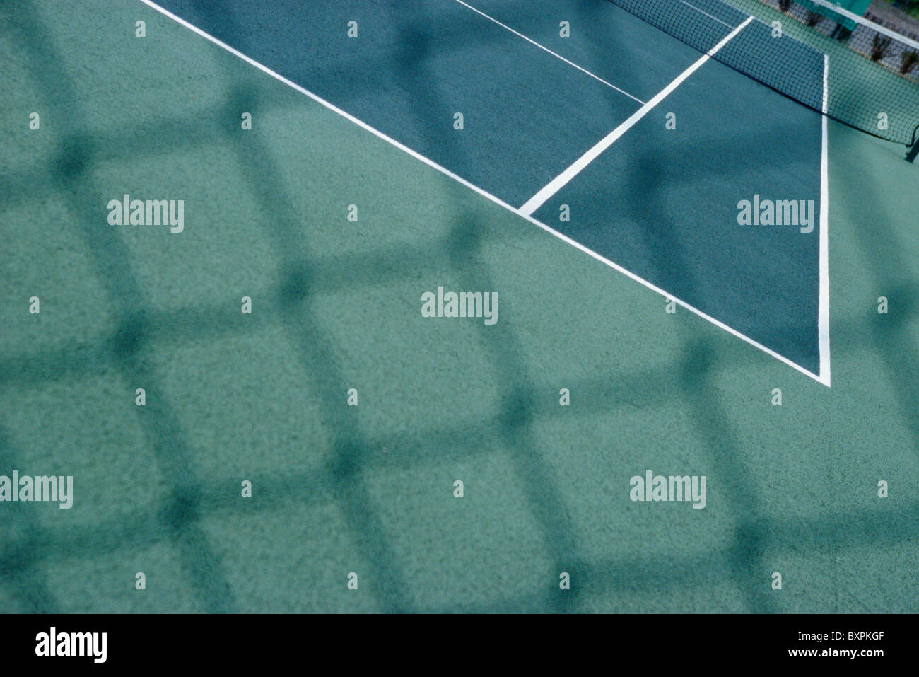 Tennis Courts As Seen Through Chain Link Fence Stock Photo