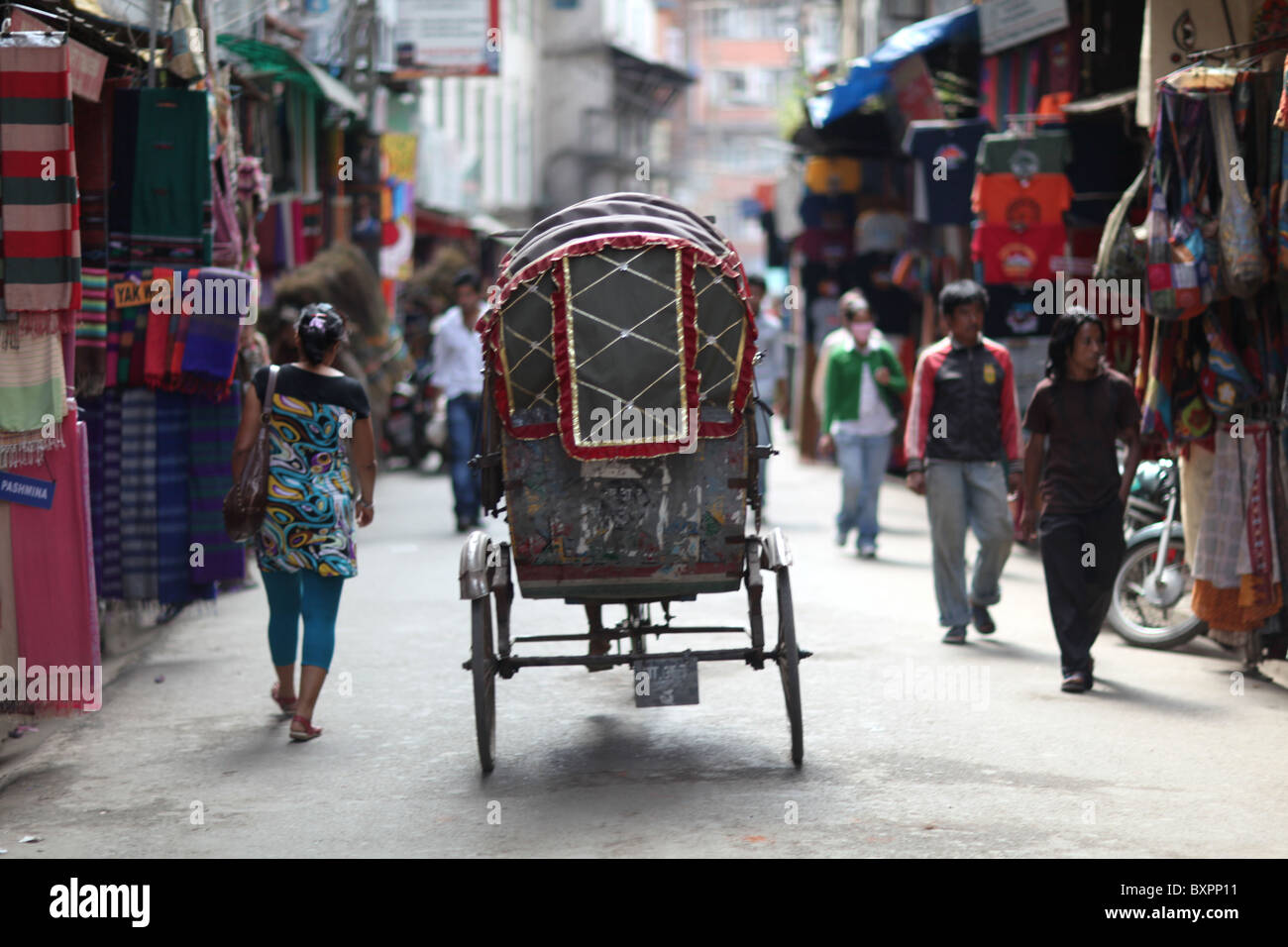 A view of rickshaw driver in the street in Kathmandu, Nepal in Asia Stock Photo