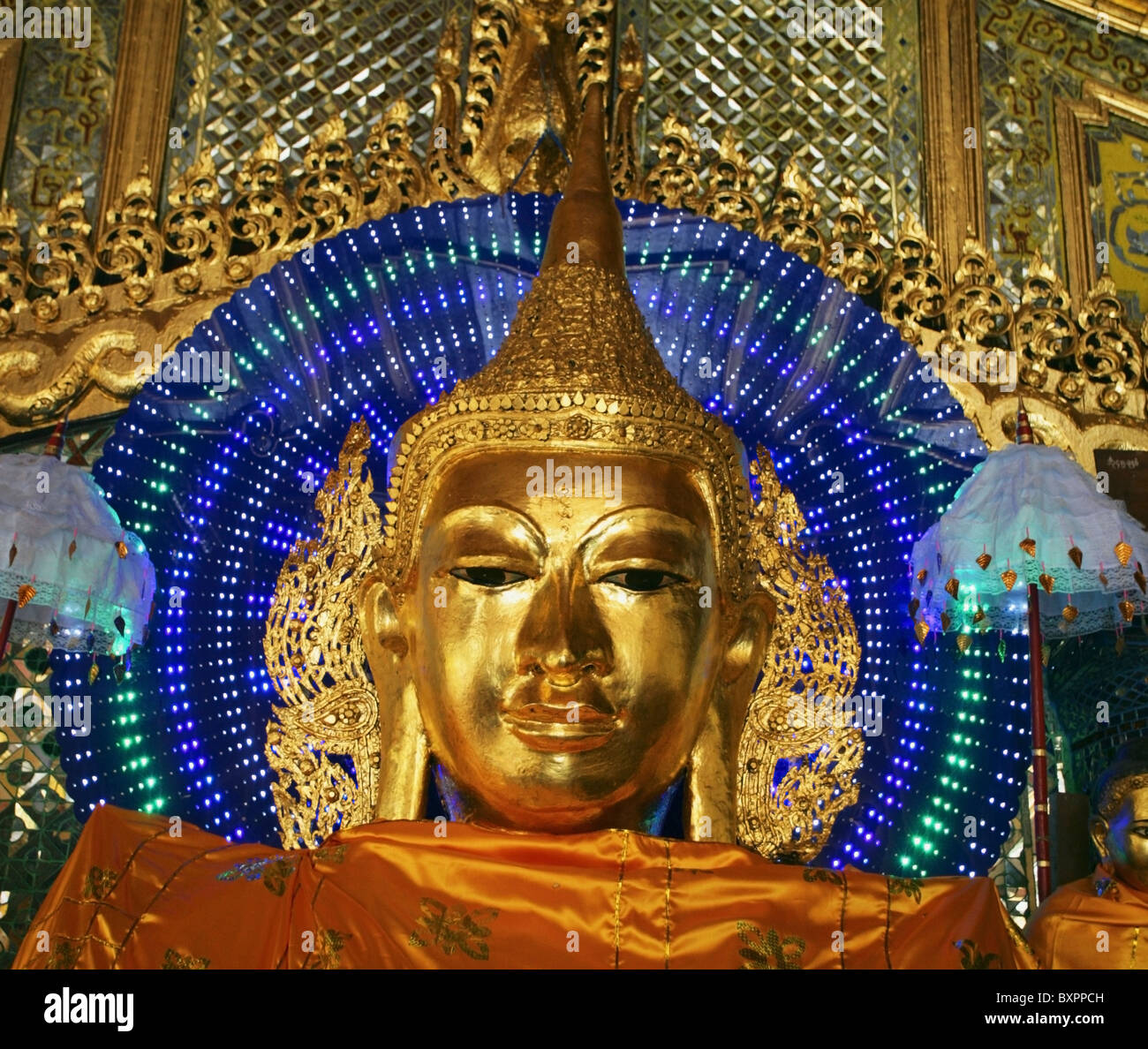 Golden Statue Of Buddha Face. Stock Photo
