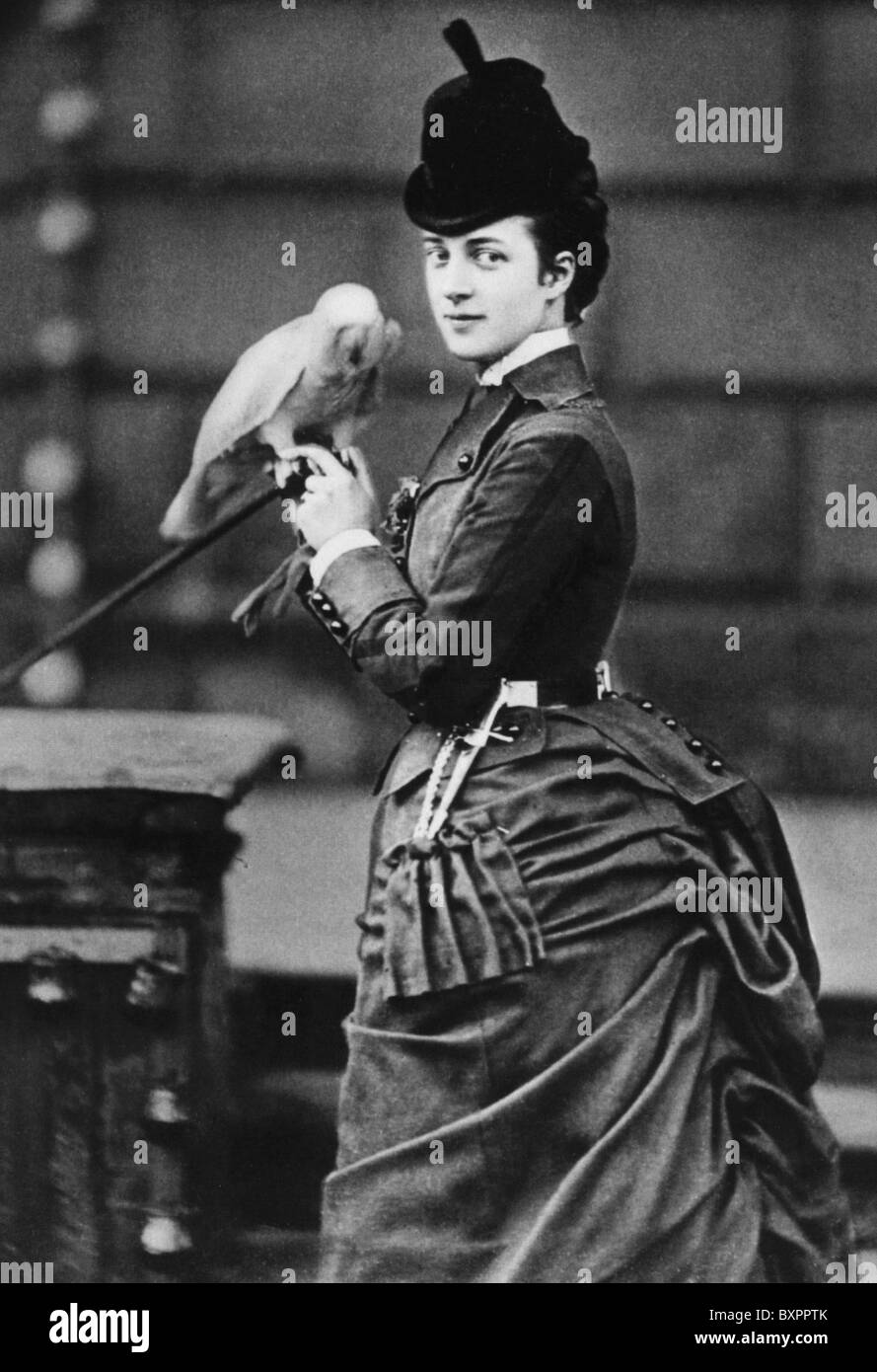ALEXANDRA, PRINCESS OF WALES (1844-1925)  British Queen as the consort of King Edward VII, here with her pet parrot Stock Photo