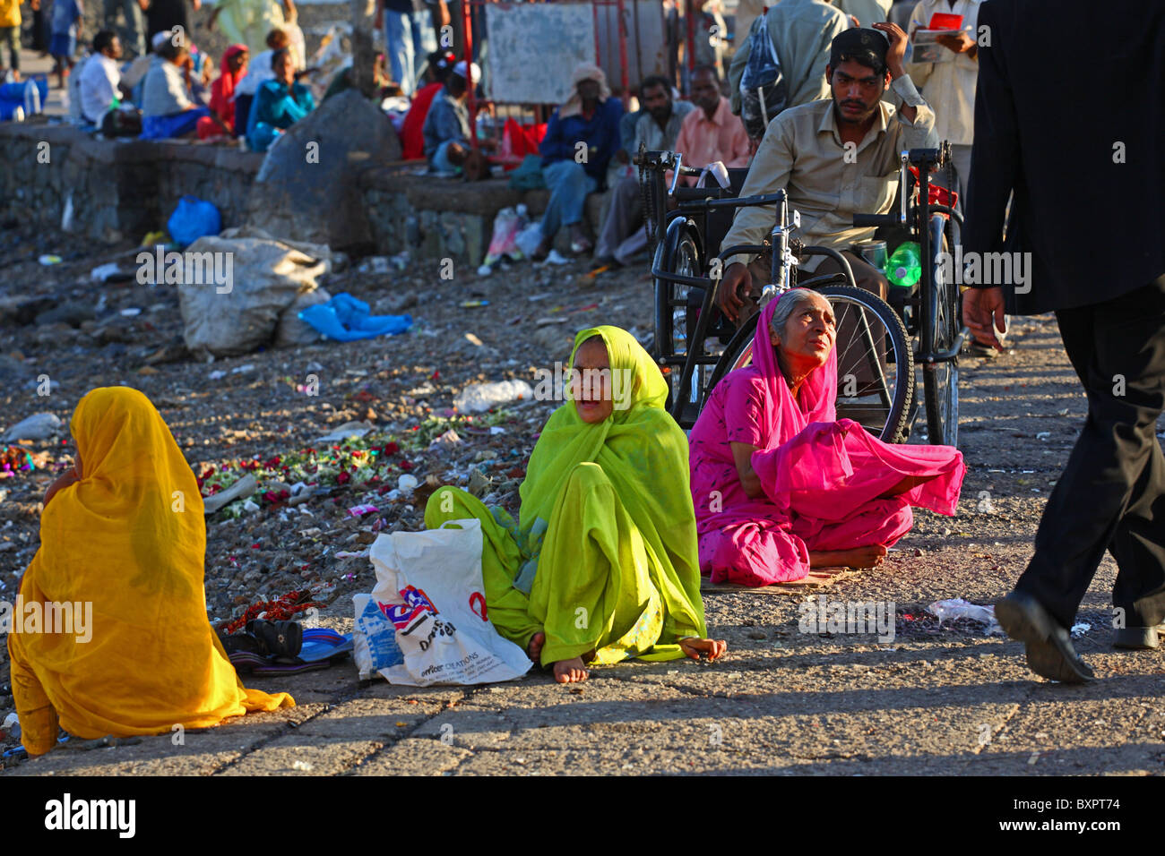 Women begging outside Hajj Ali Mosque, Mumbai, India Stock Photo