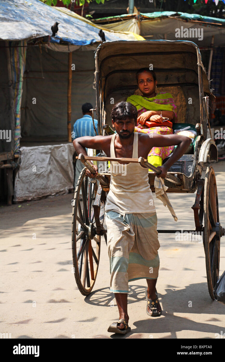Indian man pulling rickshaw passenger Calcutta Stock Photo 33693464 Alamy