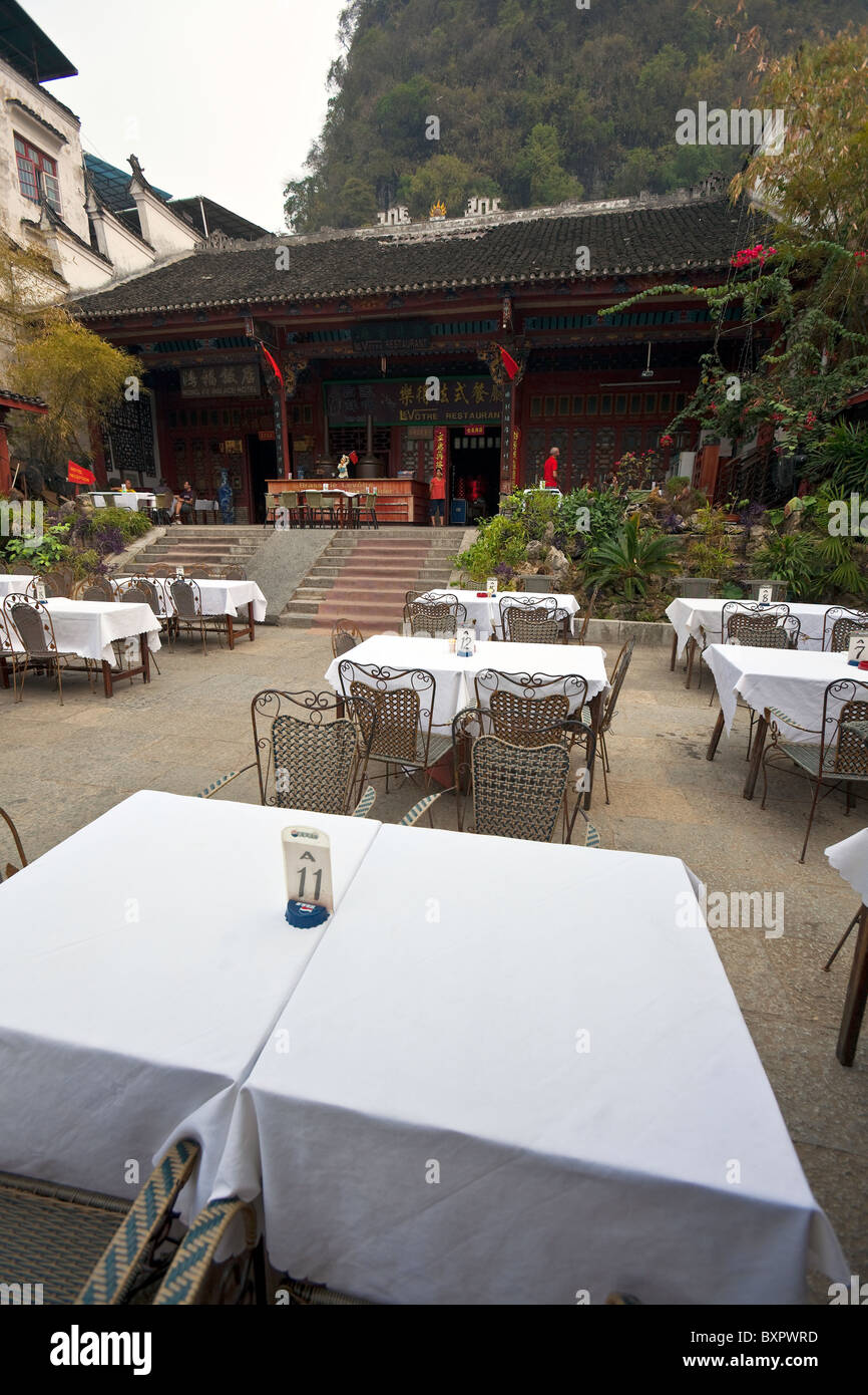 China, Guangxi Province, Yangshuo. French restaurant, former temple. Stock Photo