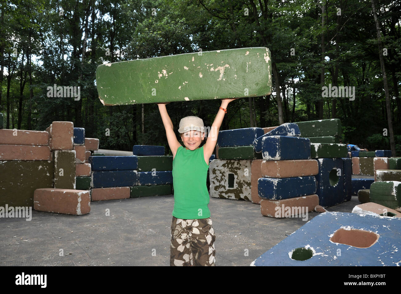 Young weightlifter lifting easily heavy rock Stock Photo