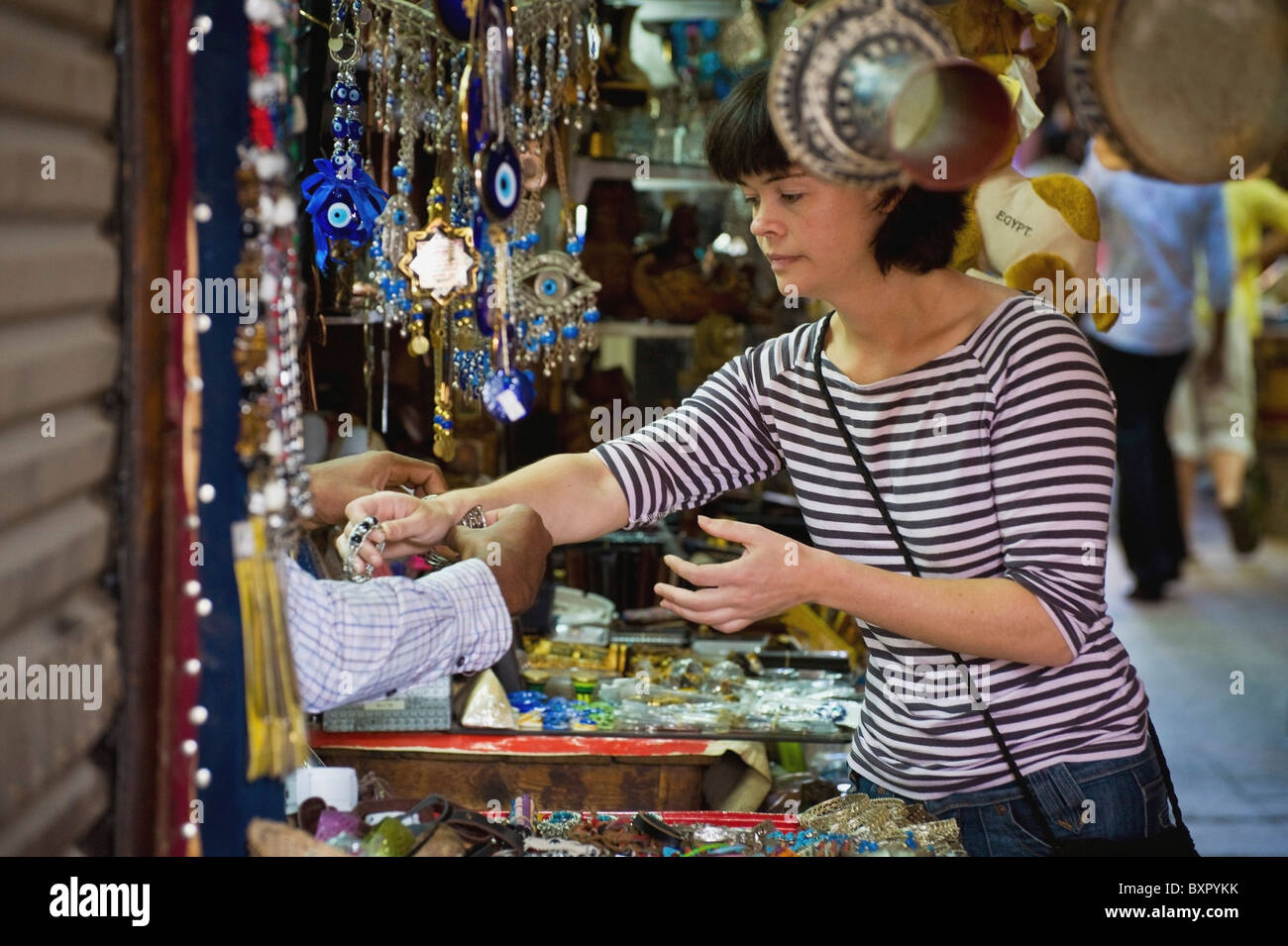 Female Tourist Buying Souvenirs On Souk Stock Photo