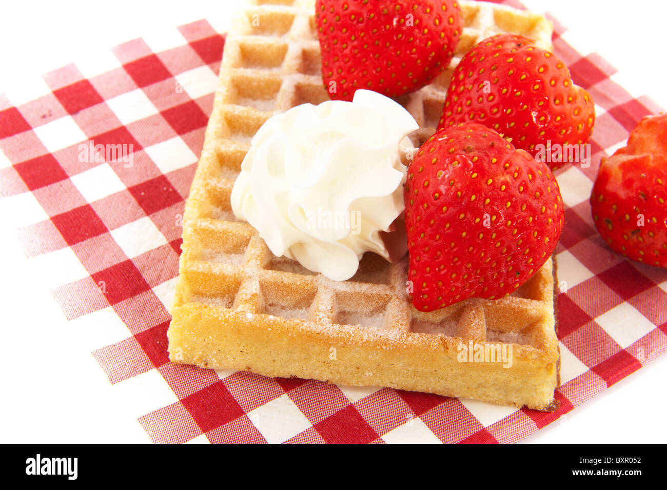 Belgium waffle with fruit and whipped cream Stock Photo - Alamy