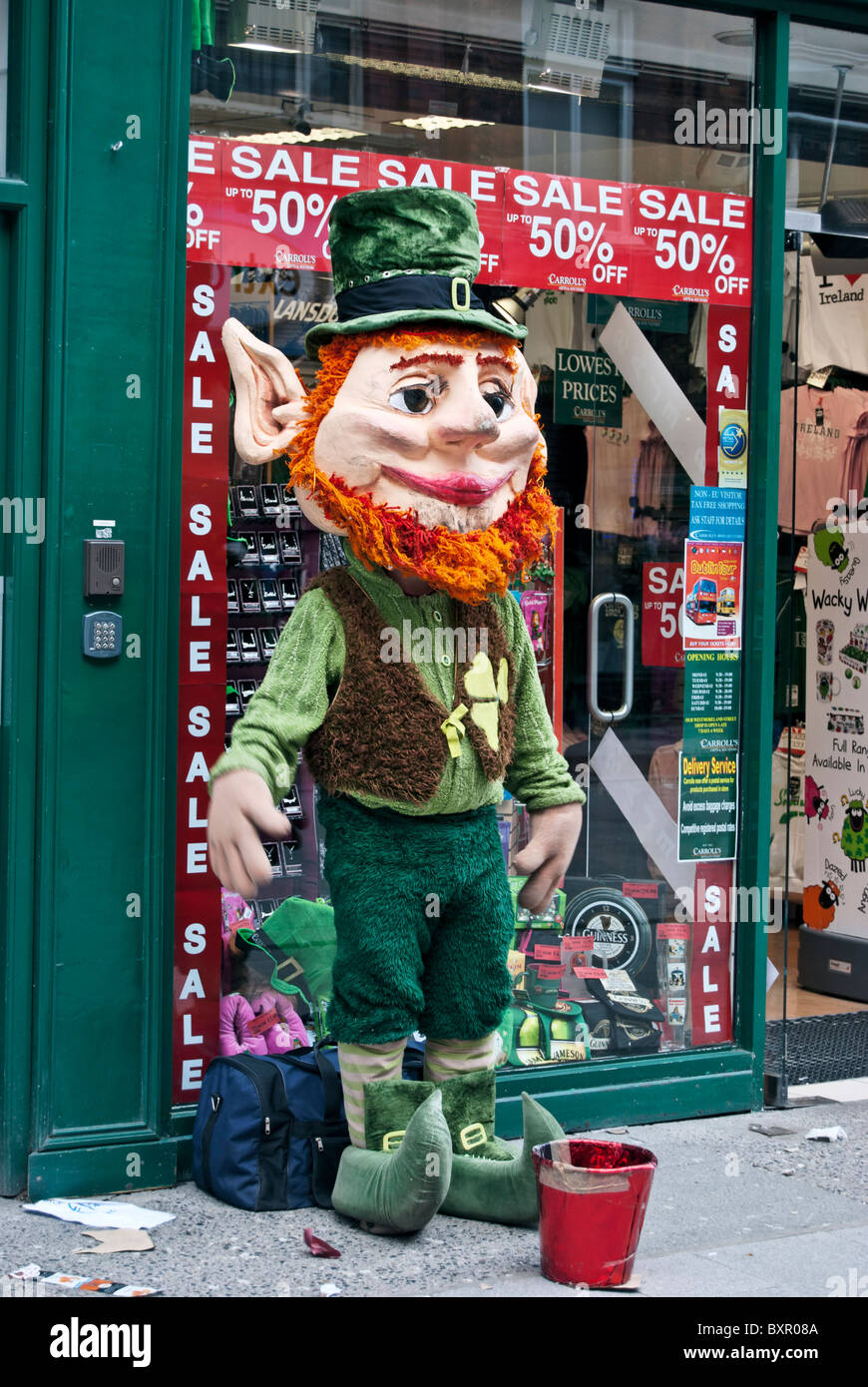 leprechaun mascot doll stores Carrolls, Dublin, Ireland Stock Photo - Alamy
