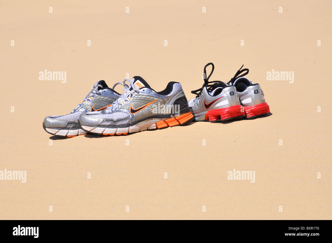 running shoes in the sand Stock Photo Alamy