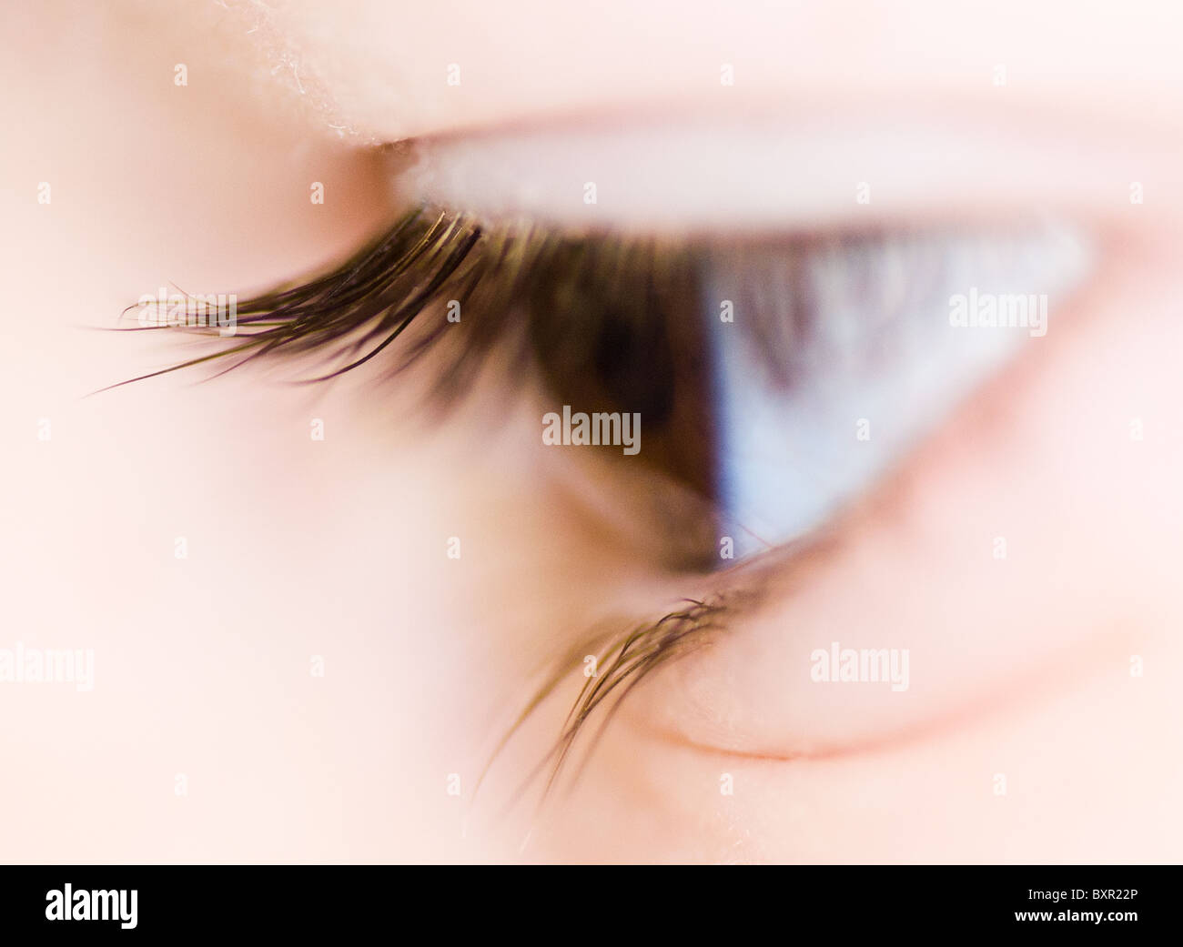 A close up side view of a child's eye Stock Photo