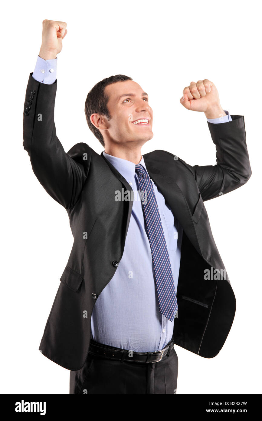 Portrait of a young happy businessman with raised hands Stock Photo - Alamy