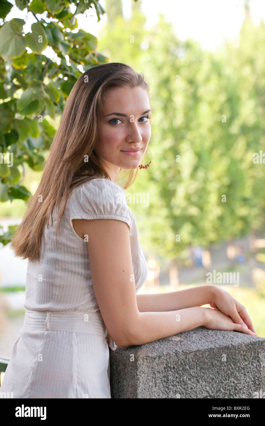 Portrait of a young woman in summer dress Stock Photo - Alamy
