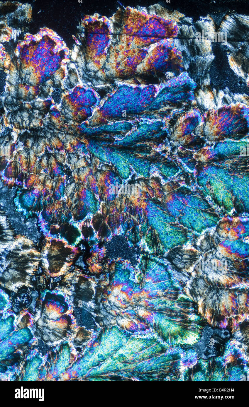 Barytes, geological microscope slide in cross polarised light Stock