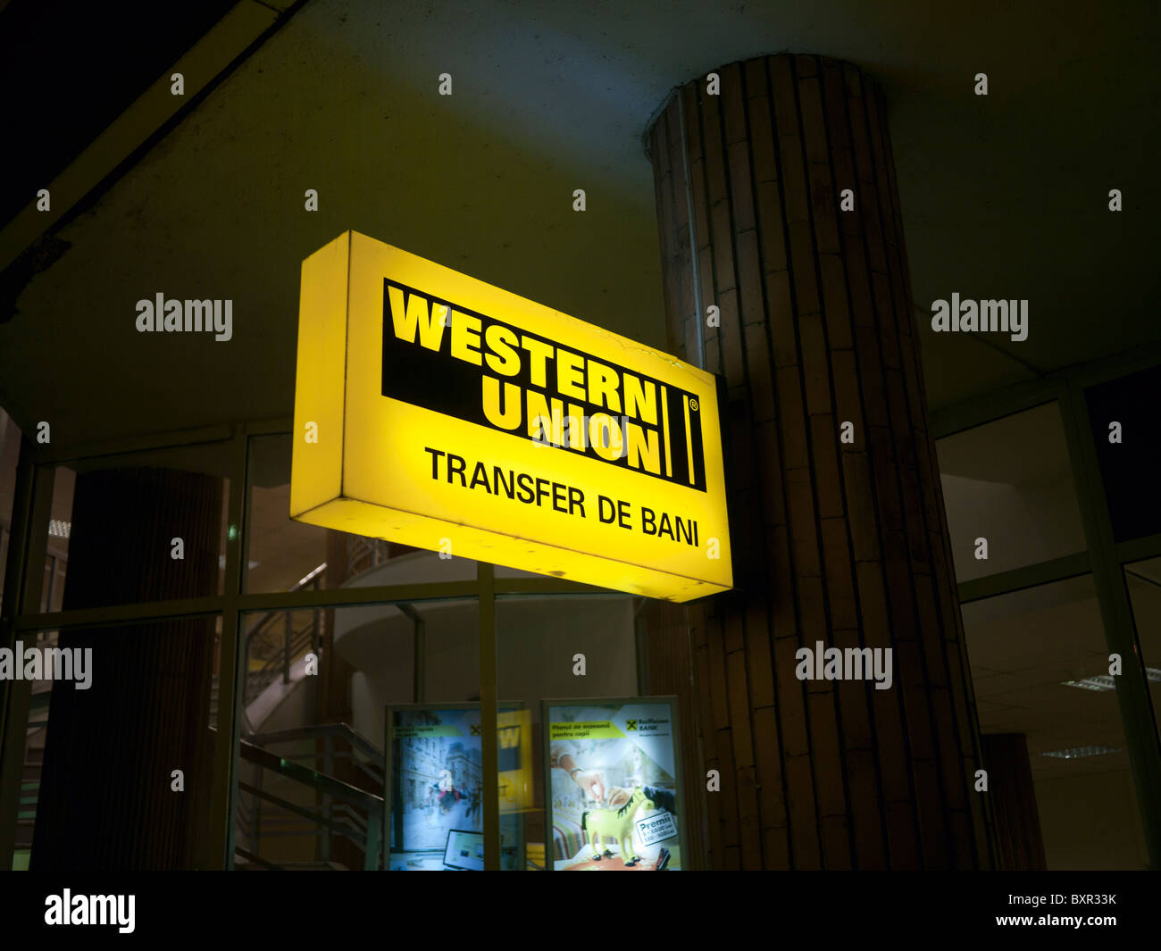 Western Union sign outside a bank in Romania Stock Photo