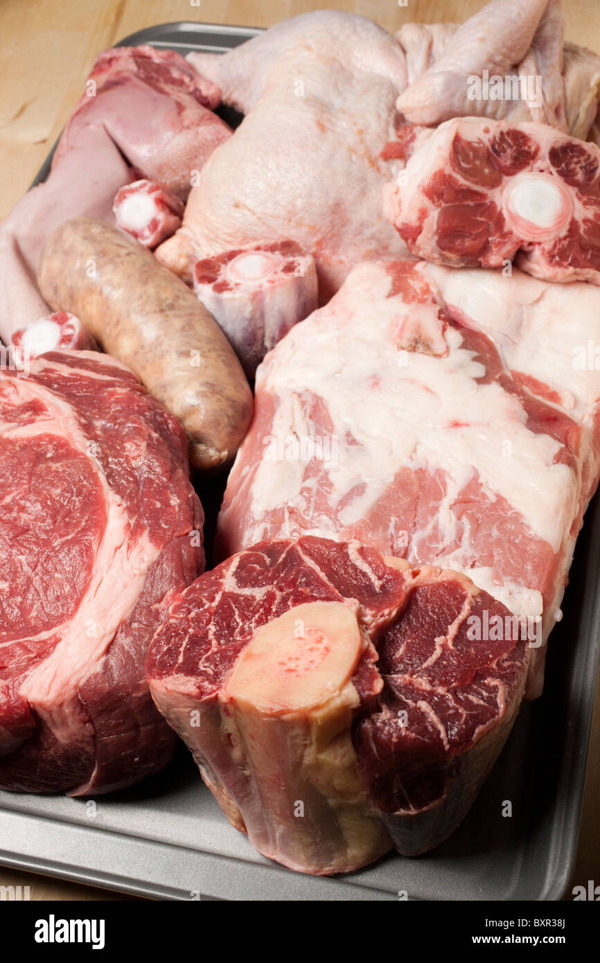 Raw ingredients for bolito misto, the classic Northern Italian meat stew Stock Photo