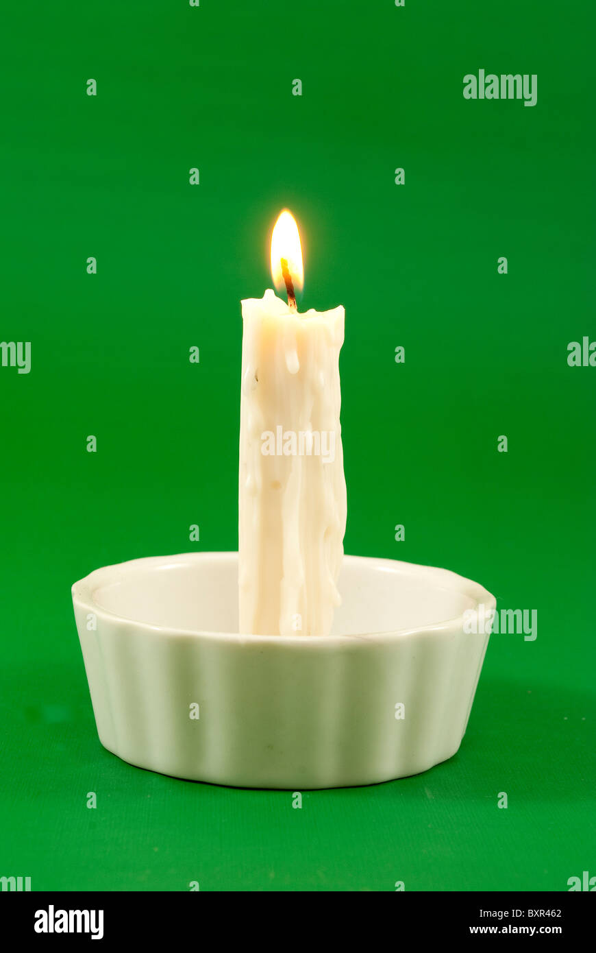 white candle lit Stock Photo Alamy
