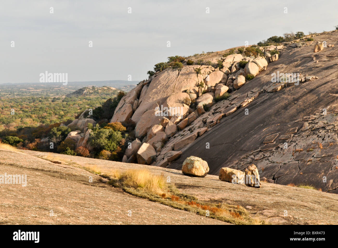 Large exfoliation blocks on granite batholith, Enchanted Rock Natural Area, Fredricksburg, Texas Stock Photo