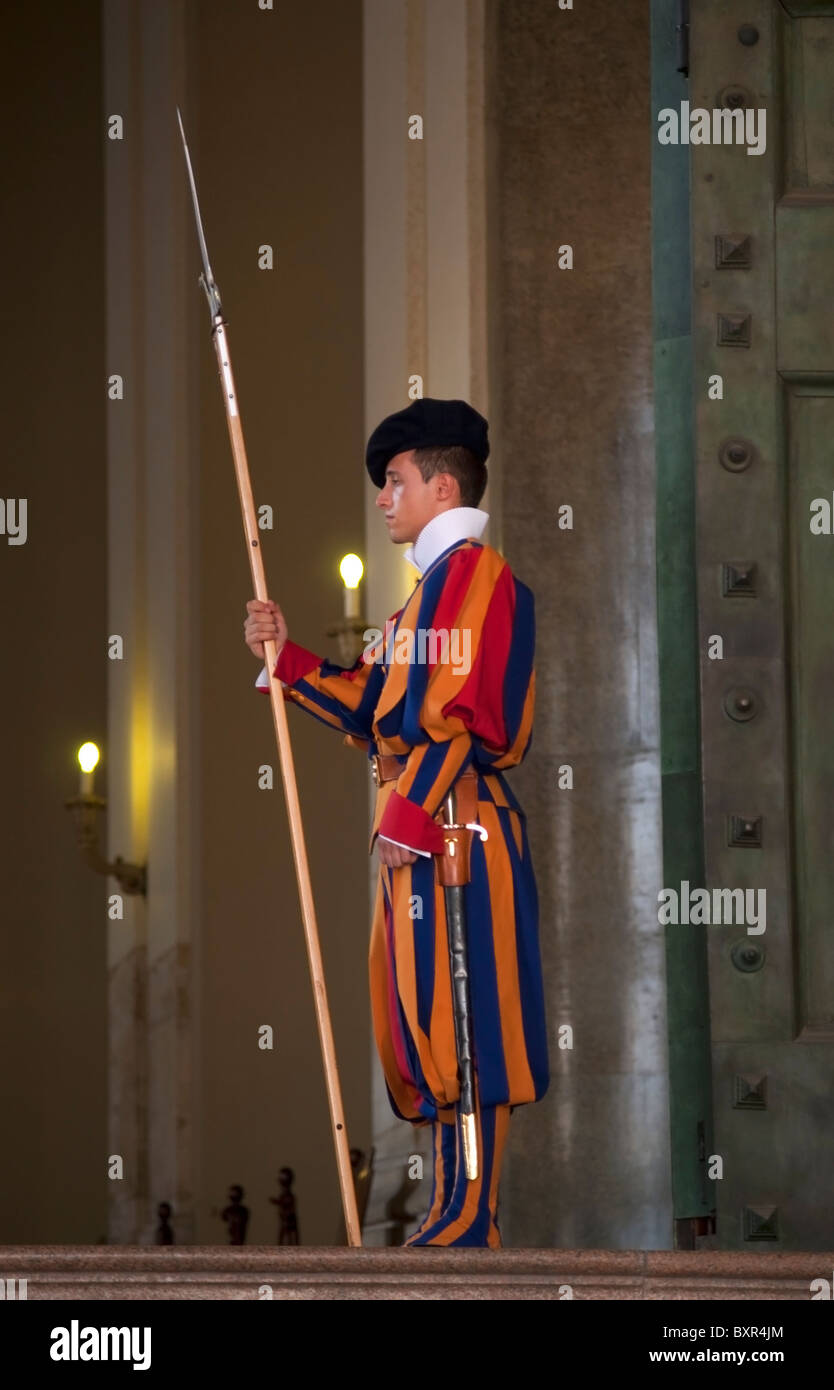 Member of the Pontifical Swiss Guard at the Bronze Door in Vatican City Stock Photo