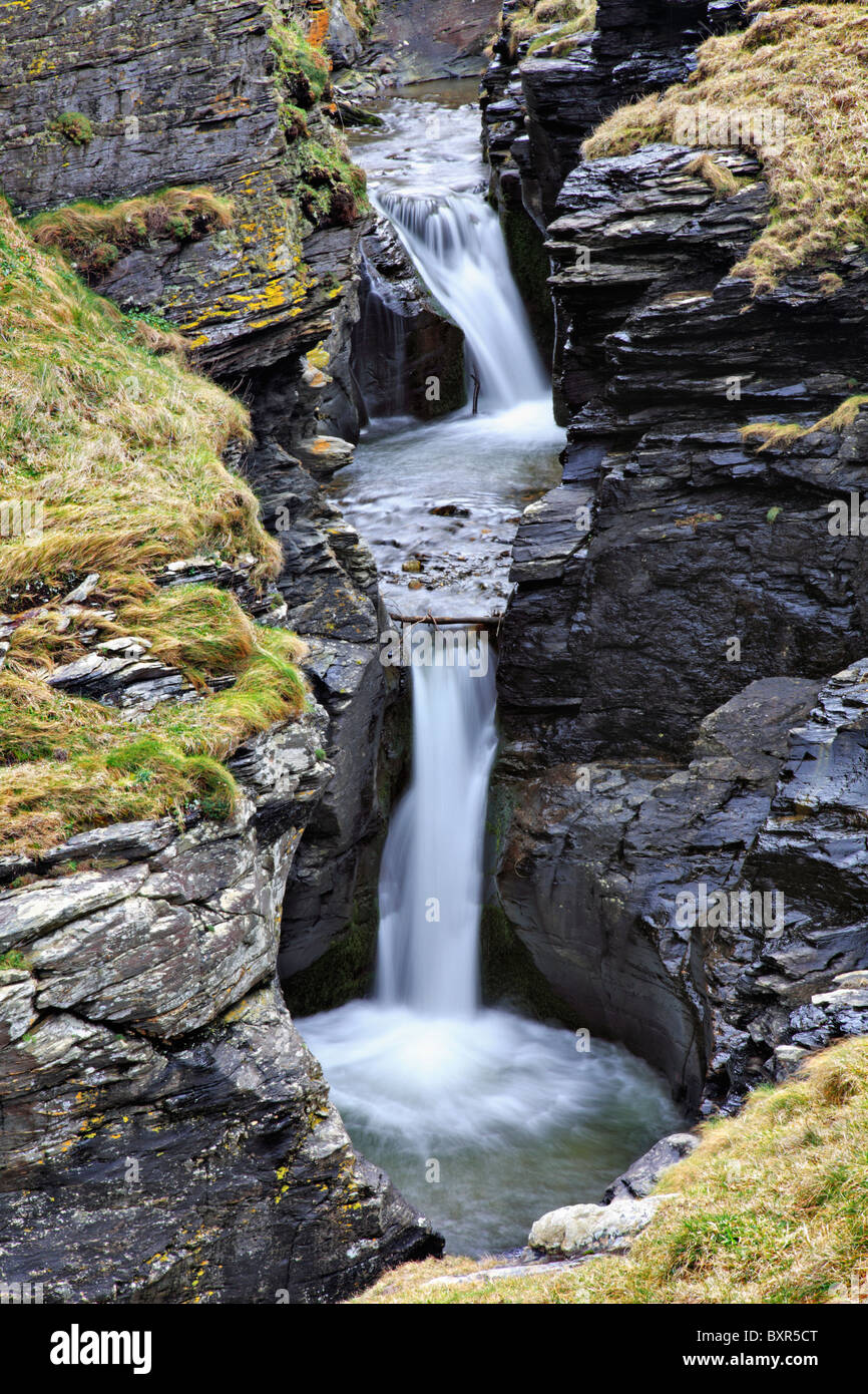 Waterfalls near the mouth of Rocky Valley near Tintagel Cornwall Stock Photo