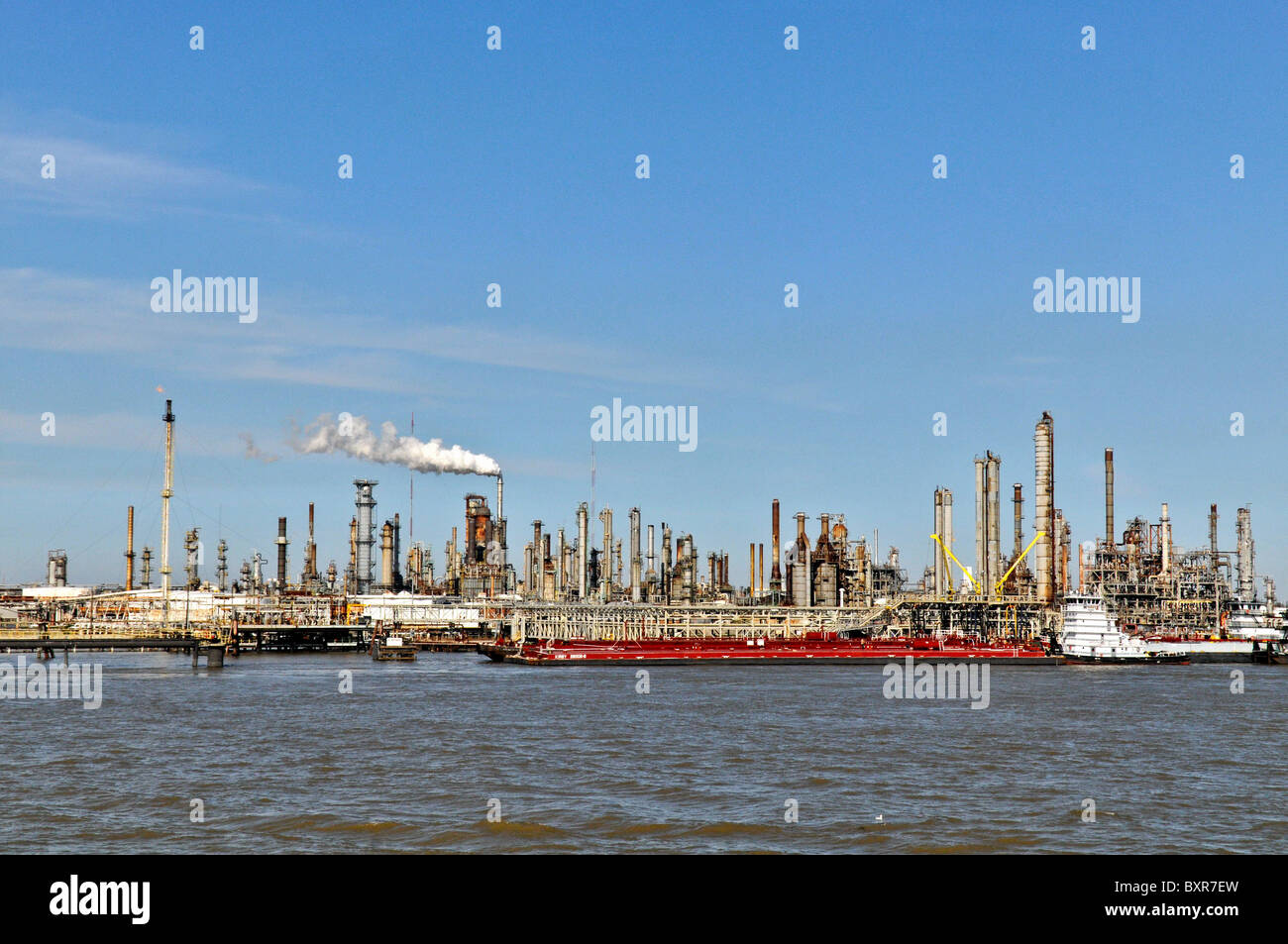 Barges unloading at Chevron oil refinery (largest refinery in US