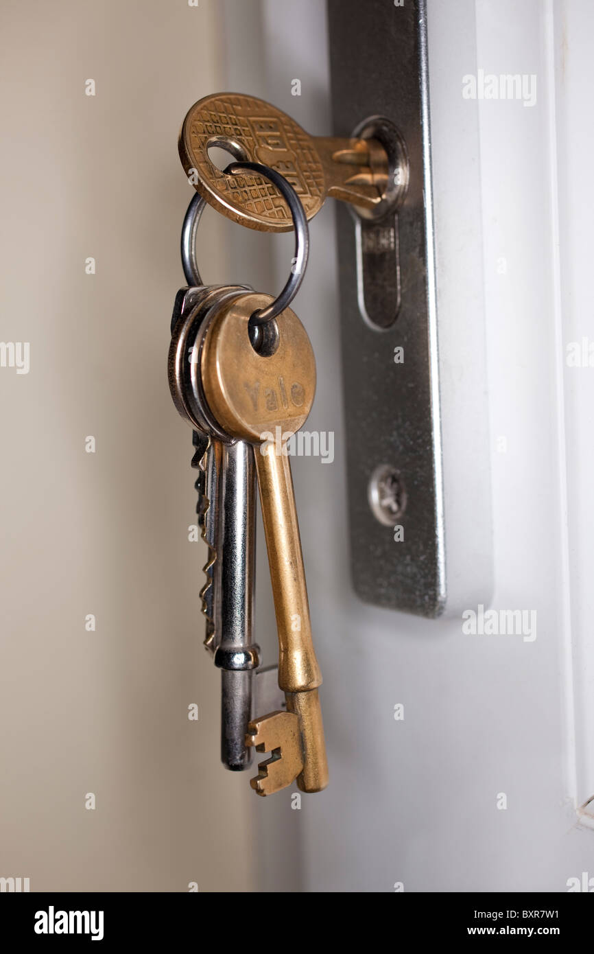 set of keys in a door lock Stock Photo