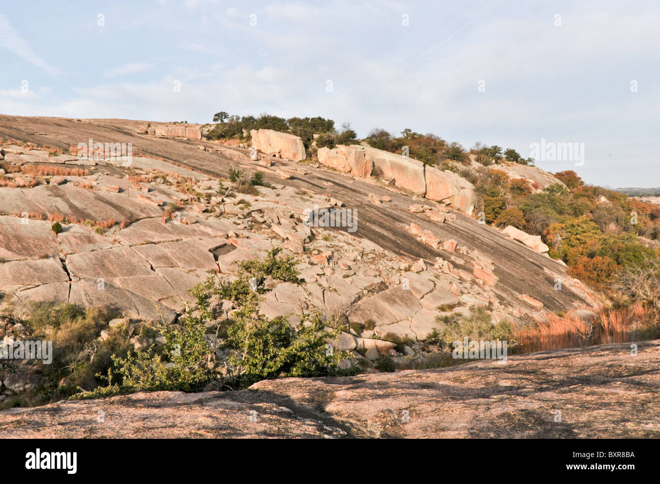 Massive exfoliation blocks on granite batholith, Enchanted Rock Natural Area, Fredricksburg, Texas Stock Photo