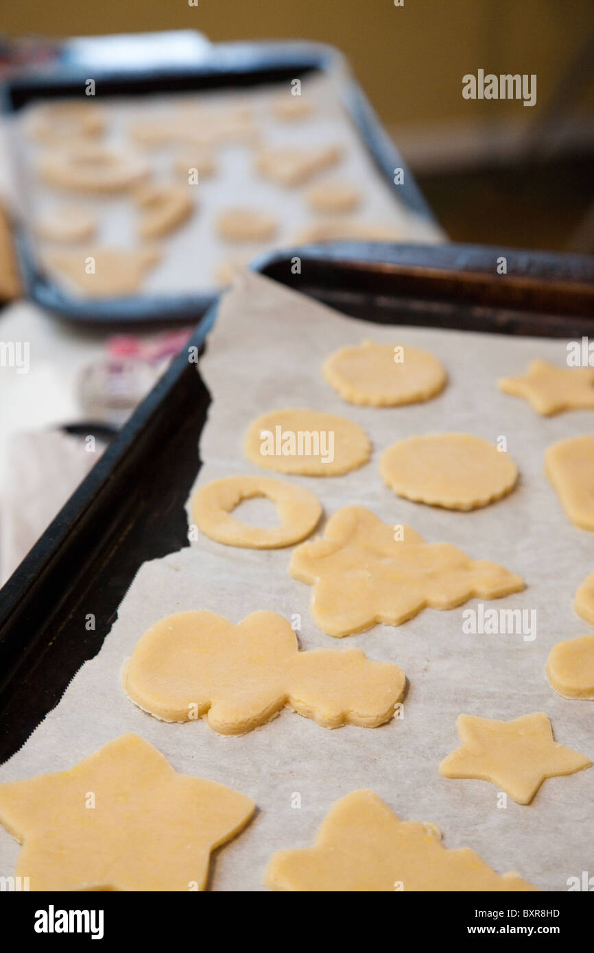 Cutout sugar cookies on cookie sheets ready to go into the oven Stock