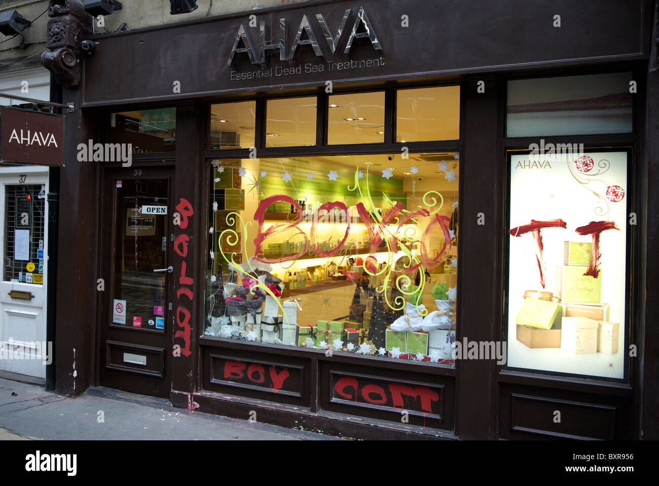 Entrance to the Ahava store which has been daubed in graffiti to boycott the store  Monmouth Street Covent Garden London Stock Photo