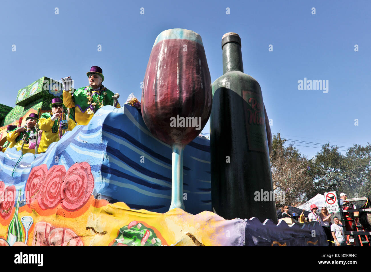 Let Me Wine and Dine You' float in Krewe of Okeanos parade, Mardi Gras 2010, New Orleans, Louisiana Stock Photo