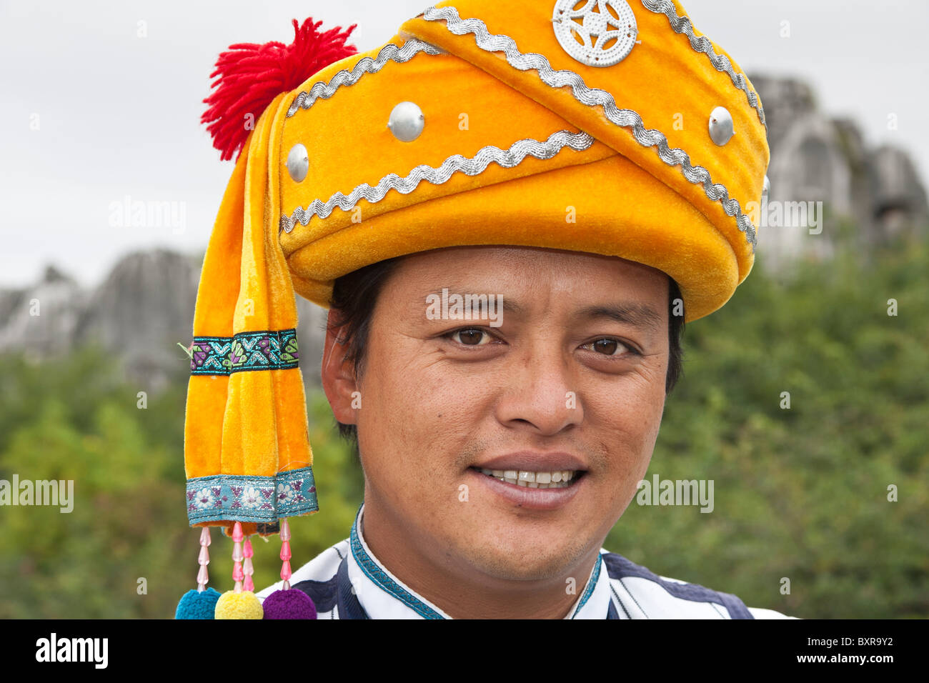 Man from the Sani minority, Shilin Yi, near Lunan and Kunming, Yunnan Province, China Stock Photo