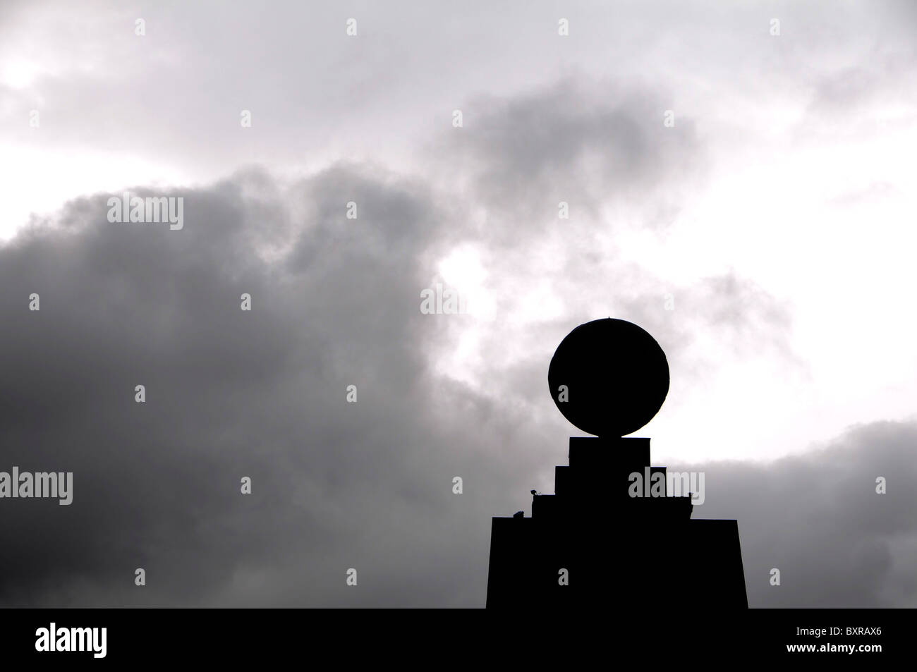 Silhouette of the monument marking the  'Mitad del Mundo' (middle of the world) near Quito, the capital of Ecuador. Stock Photo