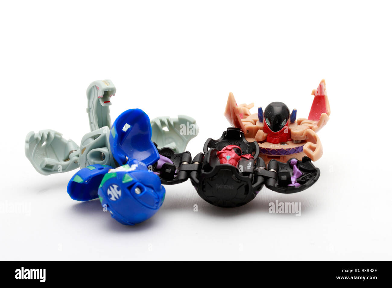 Four Bakugan  from the Japanese baku to explode'  and 'Gan' meaning 'sphere' Stock Photo