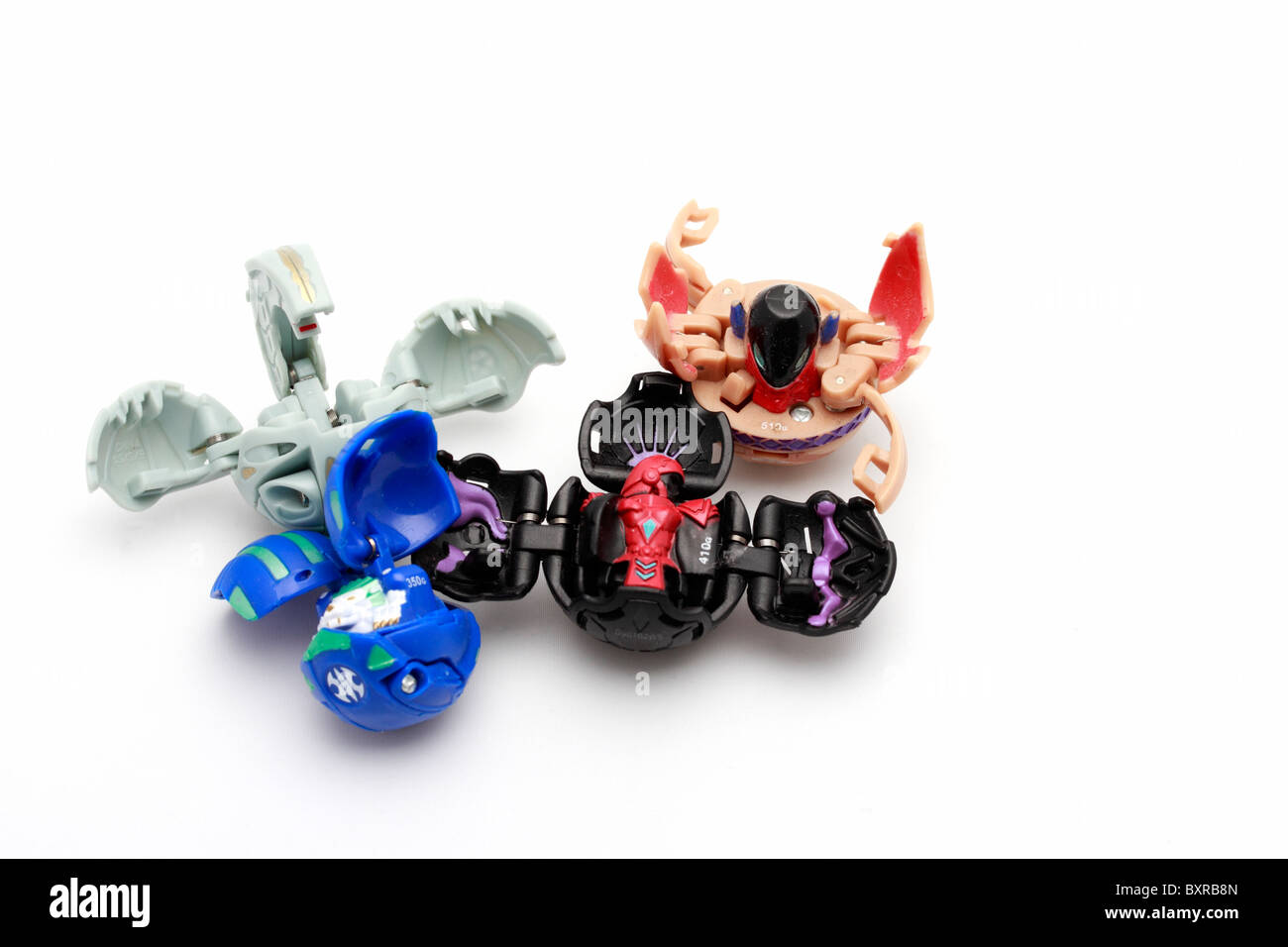 Four Bakugan from the Japanese baku to explode' and 'Gan' meaning 'sphere'  Stock Photo - Alamy