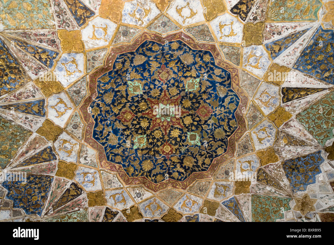 The decorative inlayed ceiling inside the Itimad Ud Daulah also known as the Baby Taj in Agra India Stock Photo