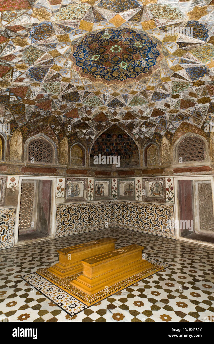 The decorative inlayed ceiling inside the Itimad Ud Daulah also known as the Baby Taj in Agra India Stock Photo