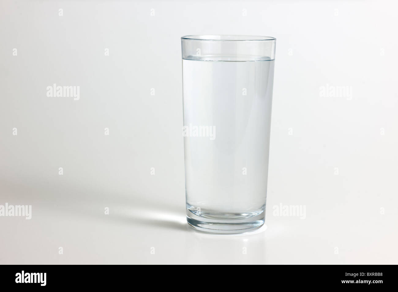 Plain glass full of water Stock Photo