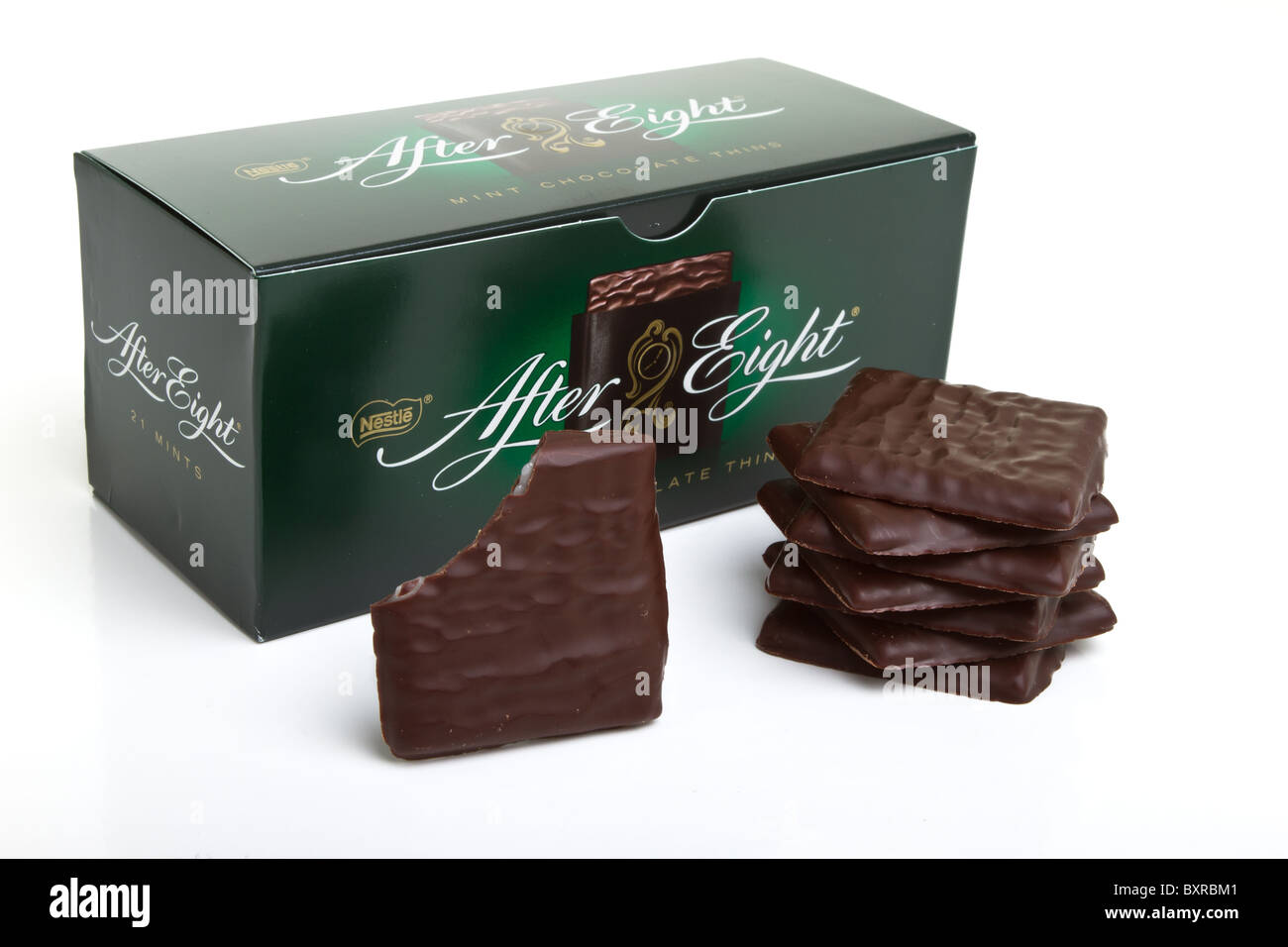 Stack of After Dinner mints with box isolated on white. Stock Photo