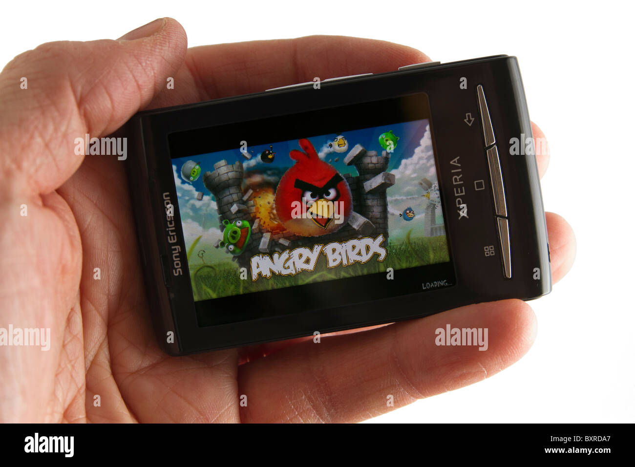 Hand the Android phone Sony Ericsson Xperia X10 mini, the smash-hit game Angry Birds, by Rovio Stock Photo - Alamy