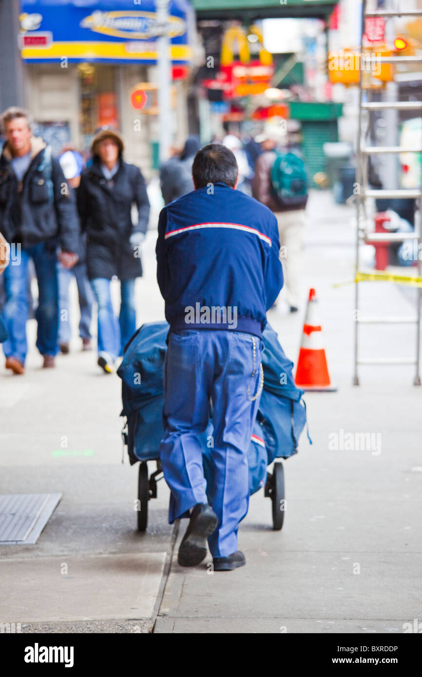 Postal carrier in Manhattan, New York City Stock Photo