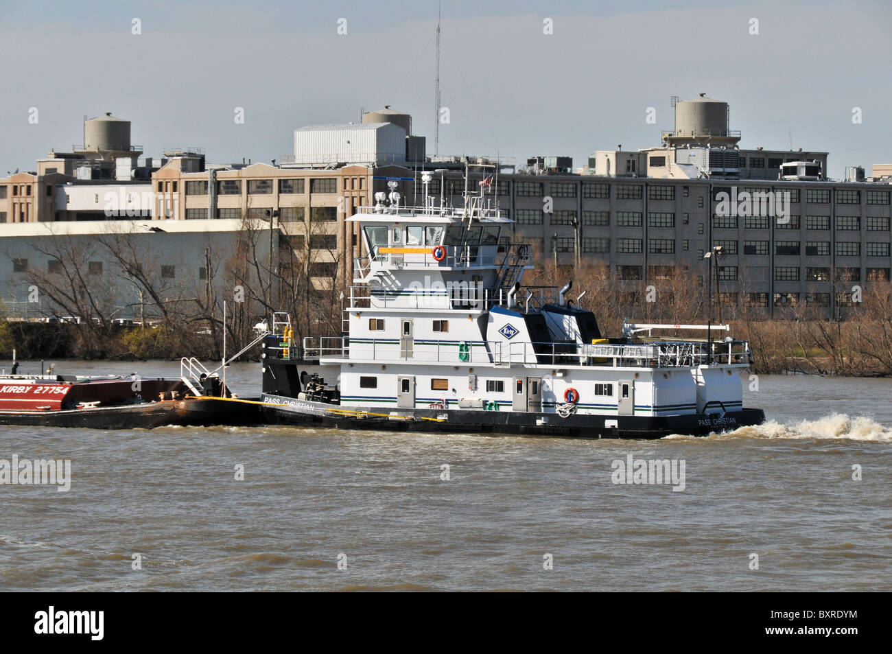 Tugboat pushing oil barge, Mississippi River, New Orleans, Louisiana Stock Photo